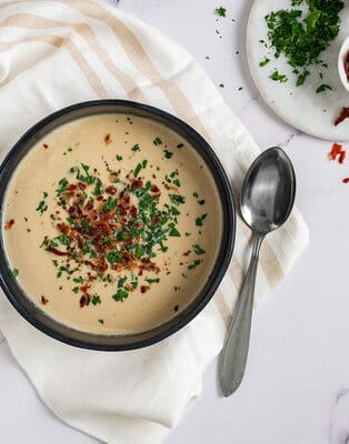Mushroom cream soup with bacon crumble