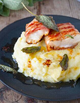 Mashed potatoes with codfish saltimbocca & sage butter