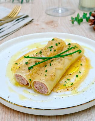 Canelones de butifarra con salsa de manzana