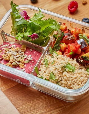 Vegetable & chickpea stew with harrisa & non-dairy red berries yogurt with granola