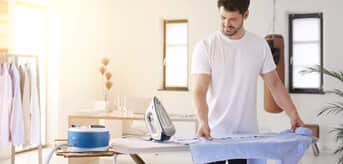 Braun CareStyle Compact – man ironing