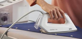 Braun CareStyle 7 steam generator iron in use