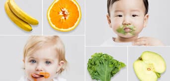 2 babies with leftover porridge around their mouths and pictures of bananas, oranges etc