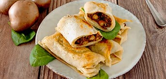 Plate of crepes with mushroom filling