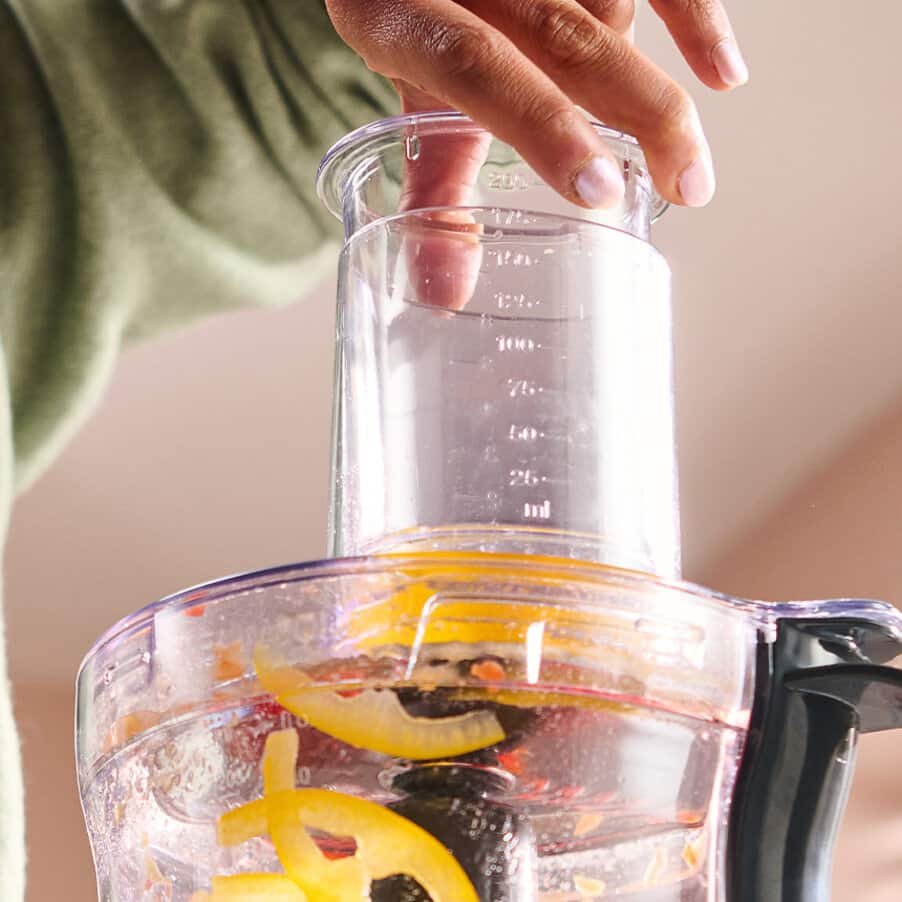 Easy access feed tube